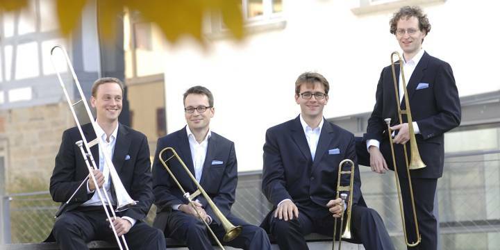 QUADRIGA Posaunenquartett, vier Personen mit Musikinstrumenten   ©JenaerPhilharmonie 